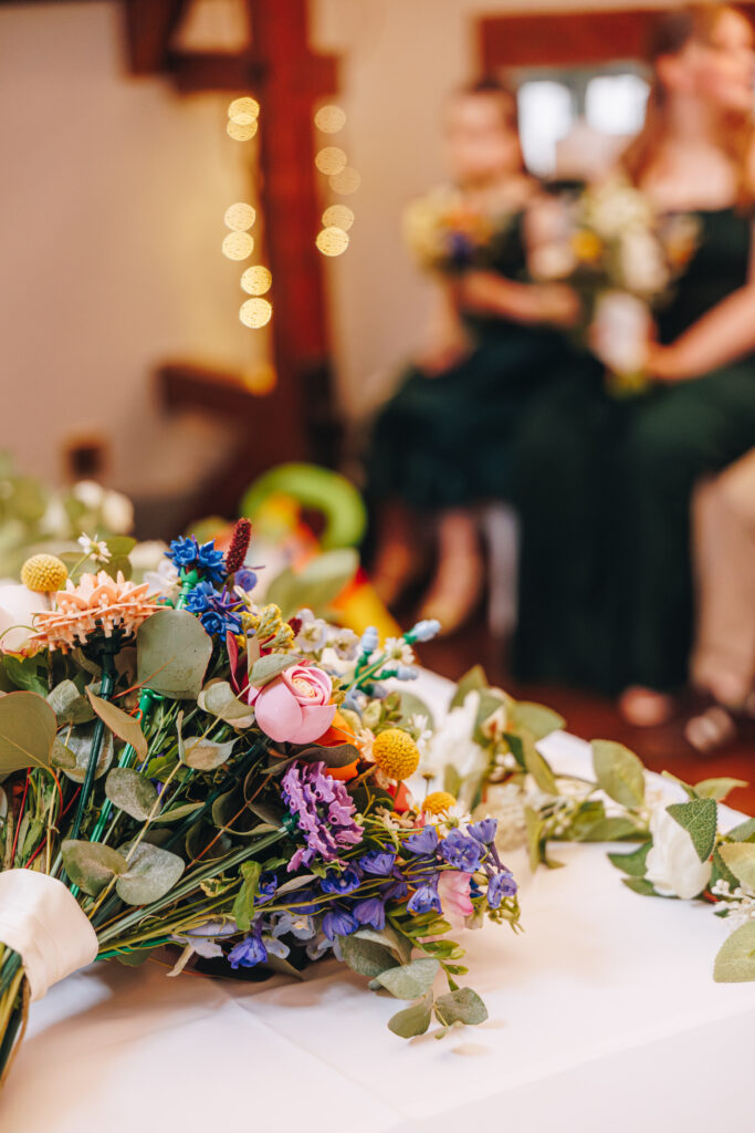 the barns hotel wedding photography by Georgia Anne Photography lego bouquet on table