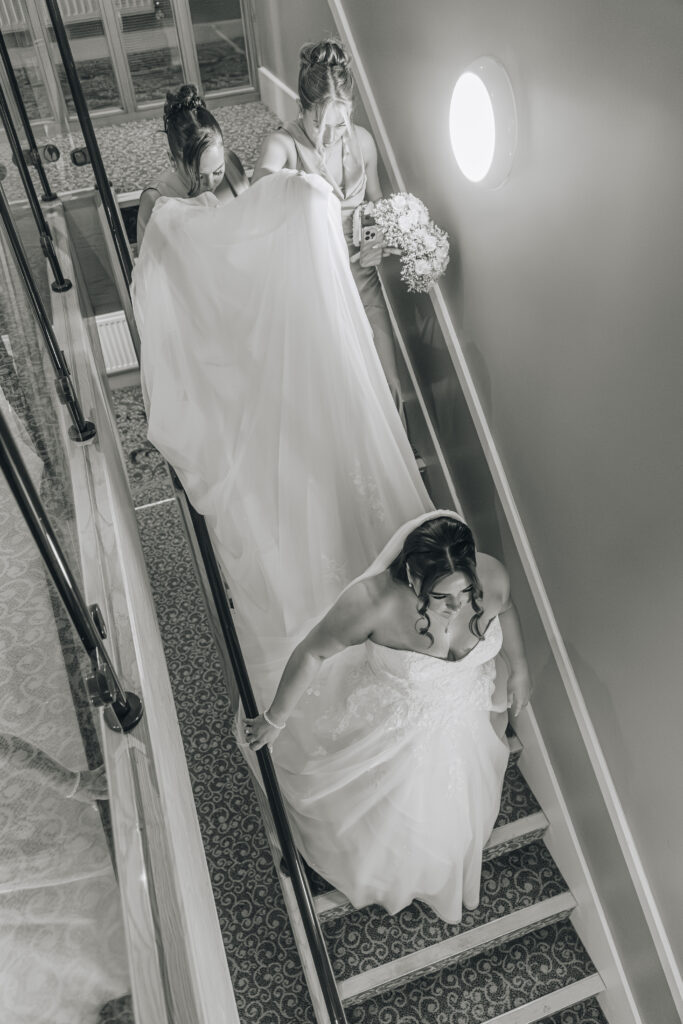 Lea Marston Hotel Bride walking downstairs